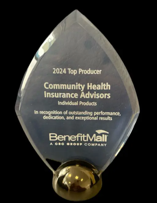 A crystal award recognizing Community Health Insurance Advisors as the 2024 Top Producer for outstanding performance by BenefitMall